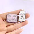 White face man alphabet style cartoon custom badge factory direct sale metal lapel pins